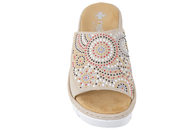 RIEKER SLENTERS I BEIGE PU MED PYNTESTEN